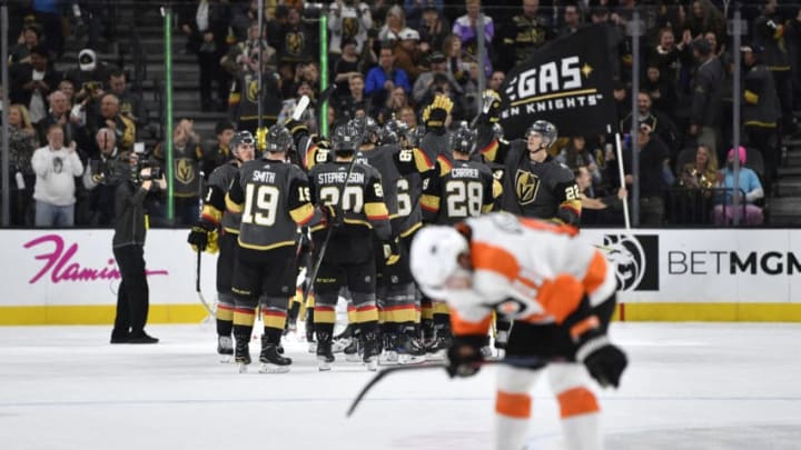 LAS VEGAS, NEVADA - JANUARY 02: The Vegas Golden Knights celebrate after defeating the Philadelphia Flyers at T-Mobile Arena on January 02, 2020 in Las Vegas, Nevada. (Photo by Jeff Bottari/NHLI via Getty Images)