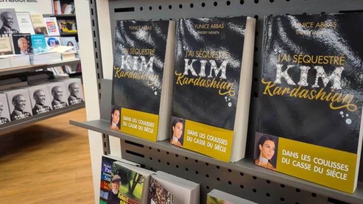 UNSPECIFIED, FRANCE - FEBRUARY 04: Copies of the book 'J'ai Séquestré Kim Kardashian' written by thief who robbed Kim Kardashian in Paris at gunpoint in 2016 are displayed in a bookstore on February 04, 2021 in Ormesson, France. Yunice Abbas is one of five men who robbed Kim Kardashian in Paris in 2016 and reveals the details of the heist in a new book published today. (Photo by Marc Piasecki/Getty Images)
