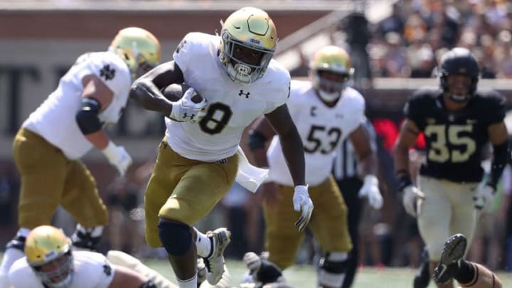 WINSTON SALEM, NC - SEPTEMBER 22: Jafar Armstrong #8 of the Notre Dame Fighting Irish runs away from Luke Masterson #12 of the Wake Forest Demon Deacons during their game at BB&T Field on September 22, 2018 in Winston Salem, North Carolina. (Photo by Streeter Lecka/Getty Images)