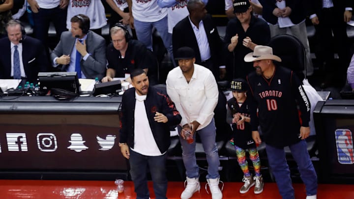 TORONTO, ON - MAY 27: Recording artist and team ambassador Drake of the Toronto Raptors looks on against the Cleveland Cavaliers in game six of the Eastern Conference Finals during the 2016 NBA Playoffs at Air Canada Centre on May 27, 2016 in Toronto, Canada. NOTE TO USER: User expressly acknowledges and agrees that, by downloading and or using this photograph, User is consenting to the terms and conditions of the Getty Images License Agreement. (Photo by Mark Blinch/Getty Images)