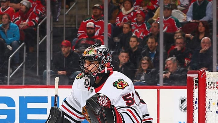 NEWARK, NJ – DECEMBER 23: Corey Crawford #50 of the Chicago Blackhawks defends his net against the New Jersey Devils at Prudential Center on December 23, 2017 in Newark, New Jersey. (Photo by Andy Marlin/NHLI via Getty Images)