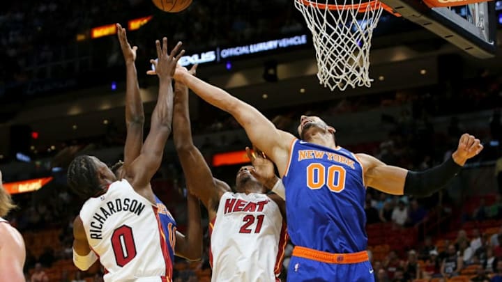 MIAMI, FL - OCTOBER 24: Josh Richardson #0 and Hassan Whiteside #21 of the Miami Heat fight for a rebound with Enes Kanter #00 of the New York Knicks during the first half at American Airlines Arena on October 24, 2018 in Miami, Florida. NOTE TO USER: User expressly acknowledges and agrees that, by downloading and or using this photograph, User is consenting to the terms and conditions of the Getty Images License Agreement. (Photo by Michael Reaves/Getty Images)