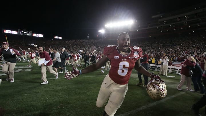 Florida State defensive end Dan Hicks storms the field with the rest of the team after beating Auburn 34-31 in the 2014 Vizio BCS National Championship at the Rose Bowl. (Photo by Robert Gauthier/Los Angeles Times via Getty Images)