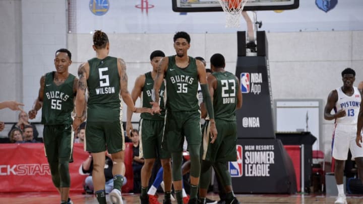 LAS VEGAS, NV - JULY 6: Christian Wood #35 of the Milwaukee Bucks exchanges high fives during the game against the Detroit Pistons during the 2018 Las Vegas Summer League on July 6, 2018 at the Cox Pavilion in Las Vegas, Nevada. NOTE TO USER: User expressly acknowledges and agrees that, by downloading and/or using this photograph, user is consenting to the terms and conditions of the Getty Images License Agreement. Mandatory Copyright Notice: Copyright 2018 NBAE (Photo by David Dow/NBAE via Getty Images)