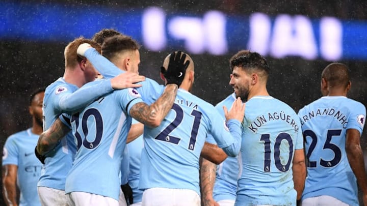 MANCHESTER, ENGLAND - JANUARY 02: Sergio Aguero of Manchester City celebrates after scoring his sides third goal with his Manchester City team mates during the Premier League match between Manchester City and Watford at Etihad Stadium on January 2, 2018 in Manchester, England. (Photo by Laurence Griffiths/Getty Images)