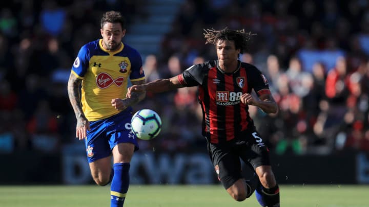 BOURNEMOUTH, ENGLAND - OCTOBER 20: Nathan Ake of AFC Bournemouth is challenged by Danny Ings of Southampton during the Premier League match between AFC Bournemouth and Southampton FC at Vitality Stadium on October 20, 2018 in Bournemouth, United Kingdom. (Photo by Marc Atkins/Getty Images)
