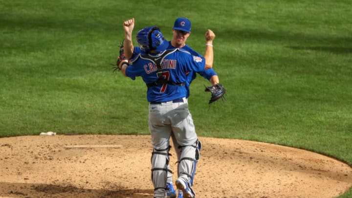 MILWAUKEE, WISCONSIN - SEPTEMBER 13: Alec Mills #30 and Victor Caratini #7 of the Chicago Cubs celebrate after Mills threw a no-hitter to beat the Milwaukee Brewers 12-0 at Miller Park on September 13, 2020 in Milwaukee, Wisconsin. (Photo by Dylan Buell/Getty Images)