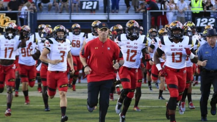 Sep 17, 2016; Orlando, FL, USA; Maryland Terrapins take the field led by Maryland Terrapins head coach DJ Durkin before the first quarter of a football game against the Central Florida Knights at Bright House Networks Stadium. Mandatory Credit: Reinhold Matay-USA TODAY Sports