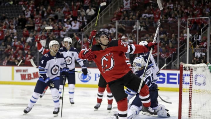 NEWARK, NJ - OCTOBER 4: Blake Coleman #20 of the New Jersey Devils celebrates after scoring a goal during the second period against the Winnipeg Jets at the Prudential Center on October 4, 2019 in Newark, New Jersey. (Photo by Adam Hunger/Getty Images)