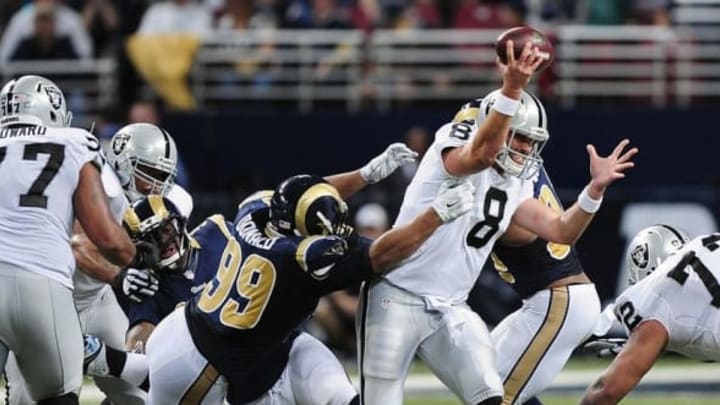 Oakland Raiders quarterback Matt Schaub is sacked by St. Louis Rams defensive tackle Aaron Donald during the second half at the Edward Jones Dome. St. Louis defeated Oakland 52-0. Credit: Jeff Curry-USA TODAY Sports