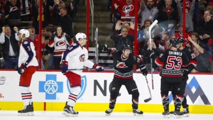 Jan 8, 2016; Raleigh, NC, USA; Carolina Hurricanes forward Chris Terry (25) celebrates his third period goal against the Columbus Blue Jackets at PNC Arena. The Carolina Hurricanes defeated the Columbus Blue Jackets 4-1. Mandatory Credit: James Guillory-USA TODAY Sports