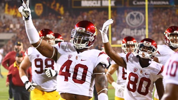 Sep 26, 2015; Tempe, AZ, USA; Southern California Trojans linebacker Jabari Ruffin (40) and wide receiver Deontay Burnett (80) celebrate following the game against the Arizona State Sun Devils at Sun Devil Stadium. Mandatory Credit: Mark J. Rebilas-USA TODAY Sports