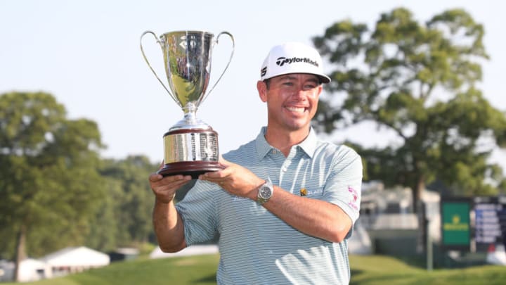 CROMWELL, CONNECTICUT - JUNE 23: Chez Reavie of the United States poses with the trophy after winning the Travelers Championship at TPC River Highlands on June 23, 2019 in Cromwell, Connecticut. (Photo by Rob Carr/Getty Images)