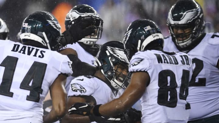 EAST RUTHERFORD, NEW JERSEY - DECEMBER 29: Boston Scott #35 of the Philadelphia Eagles reacts after scoring a touchdown during the second half of the game against the New York Giants at MetLife Stadium on December 29, 2019 in East Rutherford, New Jersey. (Photo by Sarah Stier/Getty Images)