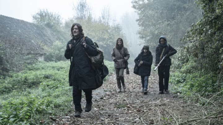 Norman Reedus as Daryl Dixon, Clémence Poésy as Isabelle, Louis Puech Scigliuzzi as Laurent, Laïka Blanc-Francard as Sylvie - The Walking Dead: Daryl Dixon _ Season 1 - Photo Credit: Stéphanie Branchu/AMC