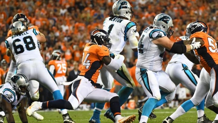 Sep 8, 2016; Denver, CO, USA; Denver Broncos outside linebacker DeMarcus Ware (94) sacks Carolina Panthers quarterback Cam Newton (1) in the third quarter at Sports Authority Field at Mile High. Mandatory Credit: Ron Chenoy-USA TODAY Sports