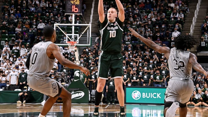 Nov 12, 2021; East Lansing, Michigan, USA; Michigan StateÕs Joey Hauser shoots a long jump shot in the second half at Jack Breslin Student Events Center. Mandatory Credit: Dale Young-USA TODAY Sports