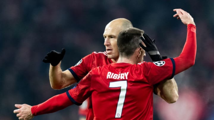 MUNICH, GERMANY - NOVEMBER 27: Arjen Robben of FC Bayern Muenchen celebrates with Franck Ribery of FC Bayern Muenchen after scoring his team's second goal during the Group E match of the UEFA Champions League between FC Bayern Muenchen and SL Benfica at Allianz Arena on November 27, 2018 in Munich, Germany. (Photo by Boris Streubel/Getty Images)