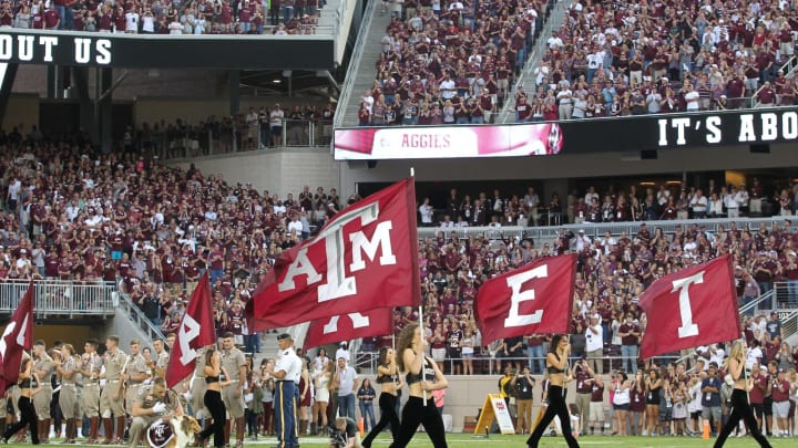 COLLEGE STATION, TX – OCTOBER 03: Flag girls enter the field before the Texas A&M Aggies played the Mississippi State Bulldogs on October 3, 2015, at Kyle Field in College Station, Texas. Aggies won 30 to 17. (Photo by Thomas B. Shea/Getty Images)