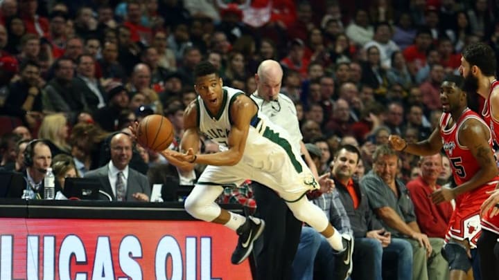 Mar 7, 2016; Chicago, IL, USA; Milwaukee Bucks forward Giannis Antetokounmpo (34) dives for a loose ball during the second half of the game against the Chicago Bulls at United Center. Mandatory Credit: Caylor Arnold-USA TODAY Sports