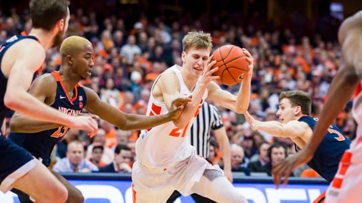 SYRACUSE, NY - MARCH 04: Marek Dolezaj #21 of the Syracuse Orange drives to the basket during the second half against the Virginia Cavaliers at the Carrier Dome on March 4, 2019 in Syracuse, New York. Virginia defeats Syracuse 79-53. (Photo by Brett Carlsen/Getty Images)