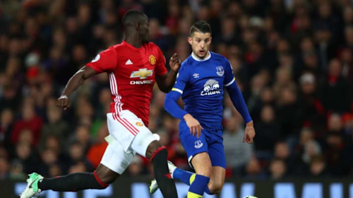 MANCHESTER, ENGLAND – APRIL 04: Kevin Mirallas of Everton (R) attempts to take the ball past Eric Bailly of Manchester United (L) during the Premier League match between Manchester United and Everton at Old Trafford on April 4, 2017 in Manchester, England. (Photo by Clive Brunskill/Getty Images)