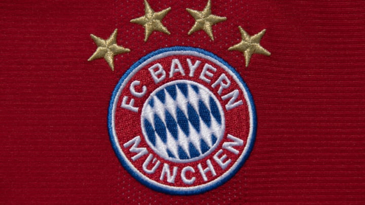 MANCHESTER, ENGLAND - AUGUST 17: The FC Bayern Munich club crest on their home shirt displaying the four stars commemorating their Bundesliga successes on August 17, 2020 in Manchester, United Kingdom. (Photo by Visionhaus)