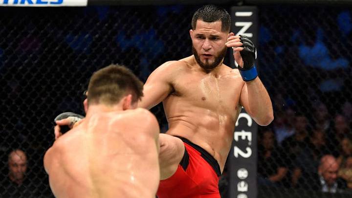 DALLAS, TX - MAY 13: (R-L) Jorge Masvidal kicks Demian Maia in their welterweight fight during the UFC 211 event at the American Airlines Center on May 13, 2017 in Dallas, Texas. (Photo by Josh Hedges/Zuffa LLC/Zuffa LLC via Getty Images)
