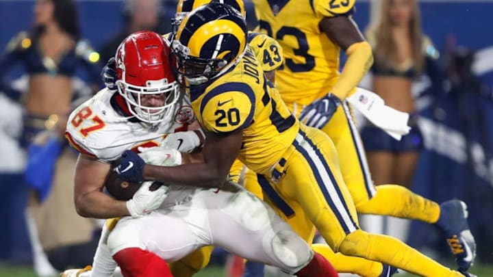 LOS ANGELES, CA - NOVEMBER 19: Lamarcus Joyner #20 of the Los Angeles Rams tackles Travis Kelce #87 of the Kansas City Chiefs after a pass play which ended on the five yard line during the third quarter of the game at Los Angeles Memorial Coliseum on November 19, 2018 in Los Angeles, California. (Photo by Sean M. Haffey/Getty Images)