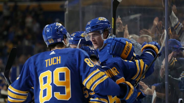 BUFFALO, NEW YORK - NOVEMBER 10: Tage Thompson #72 of the Buffalo Sabres celebrates with teammates after his goal during the first period of an NHL hockey game against the Vegas Golden Knights at KeyBank Center on November 10, 2022 in Buffalo, New York. (Photo by Joshua Bessex/Getty Images)