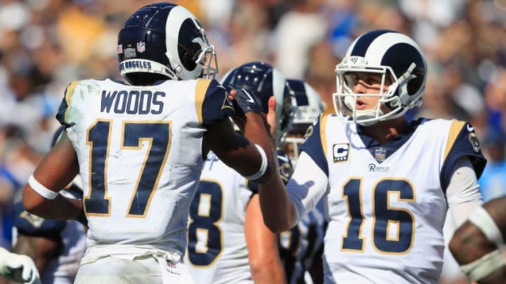 LOS ANGELES, CA - SEPTEMBER 23: Robert Woods #17 of the Los Angeles Rams celebrates his touchdown with quarterback Jared Goff #16 during the third quarter of the game against the Los Angeles Chargers at Los Angeles Memorial Coliseum on September 23, 2018 in Los Angeles, California. (Photo by Sean M. Haffey/Getty Images)
