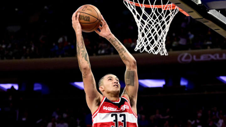 NEW YORK, NEW YORK - OCTOBER 15: Kyle Kuzma #33 of the Washington Wizards dunks the ball against the New York Knicks during a preseason game at Madison Square Garden on October 15, 2021 in New York City. NOTE TO USER: User expressly acknowledges and agrees that, by downloading and or using this photograph, user is consenting to the terms and conditions of the Getty Images License Agreement. (Photo by Steven Ryan/Getty Images)