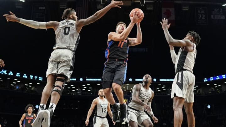 BROOKLYN, NY - DECEMBER 17: Keyontae Johnson #11 of the Florida Gators shoots against the Providence Friars during the Basketball Hall of Fame Invitational at the Barclays Center on December 17, 2019 in the Brooklyn borough of New York City. (Photo by Porter Binks/Getty Images) BROOKLYN, NY - DECEMBER 17: Keyontae Johnson #11 of the Florida Gators shoots against the Providence Friars during the Basketball Hall of Fame Invitational at the Barclays Center on December 17, 2019 in the Brooklyn borough of New York City. (Photo by Porter Binks/Getty Images)