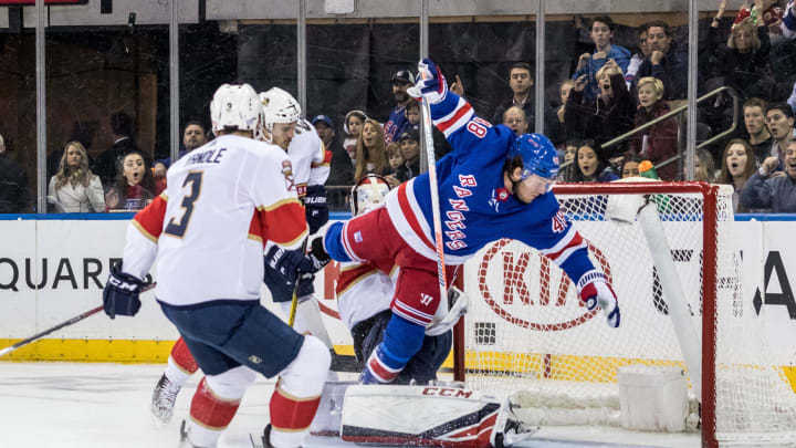 NEW YORK, NY – NOVEMBER 10: New York Rangers Left Wing Brendan Lemieux (48) flies over Florida Panthers Goalie Samuel Montembeault (33) during an Eastern Conference match-up between the Florida Panthers and the New York Rangers on November 10, 2019, at Madison Square Garden in New York, NY. (Photo by David Hahn/Icon Sportswire via Getty Images)