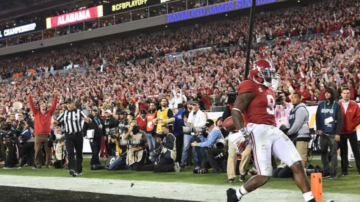 Jan 9, 2017; Tampa, FL, USA; Alabama Crimson Tide running back Bo Scarbrough (9) scores a touchdown during the second quarter against the Clemson Tigers in the 2017 College Football Playoff National Championship Game at Raymond James Stadium. Mandatory Credit: John David Mercer-USA TODAY Sports