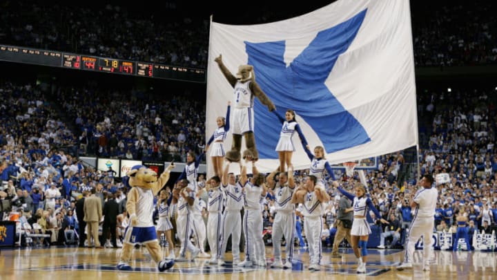 LEXINGTON, KY - JANUARY 9: The mascots and cheerleaders of the Kentucky Wildcats build a pyramid during the game against the Kansas Jayhawks on January 9, 2005 at Rupp Arena in Lexington, Kentucky. Kansas defeated Kentucky 65-59. (Photo by Andy Lyons/Getty Images)