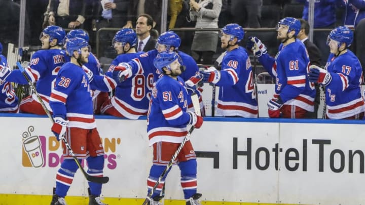 NEW YORK, NY - DECEMBER 19: Rangers teammates congratulate New York Rangers Center David Desharnais (51) after he scores goal during the Anaheim Ducks and New York Rangers NHL game on December 19, 2017, at Madison Square Garden in New York, NY. (Photo by John Crouch/Icon Sportswire via Getty Images)