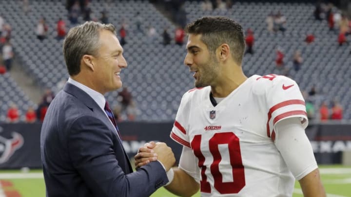 HOUSTON, TX - DECEMBER 10: Jimmy Garoppolo #10 of the San Francisco 49ers celebrates with general manager John Lynch after the game against the Houston Texans at NRG Stadium on December 10, 2017 in Houston, Texas. (Photo by Tim Warner/Getty Images)