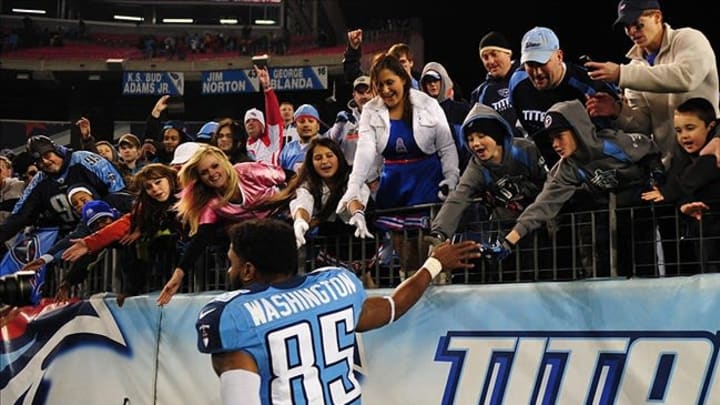 Dec 17, 2012; Nashville, TN, USA; Tennessee Titans wide receiver Nate Washington (85) greets fans after a game against the New York Jets at LP Field. The Titans beat the Jets 14-10. Mandatory credit: Don McPeak-USA TODAY Sports