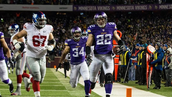 Dec 27, 2015; Minneapolis, MN, USA; Minnesota Vikings safety Harrison Smith (22) returns an interception for a touchdown during the second quarter against the New York Giants at TCF Bank Stadium. Mandatory Credit: Brace Hemmelgarn-USA TODAY Sports