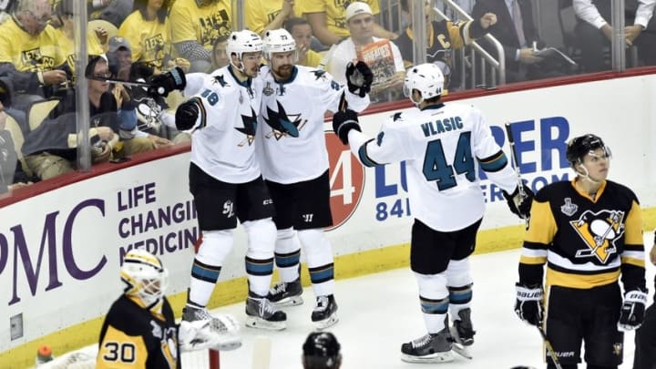 May 30, 2016; Pittsburgh, PA, USA; San Jose Sharks center Tomas Hertl (48) celebrates with right wing Joonas Donskoi (27) and defenseman Marc-Edouard Vlasic (44) after scoring a goal against the Pittsburgh Penguins in the second period in game one of the 2016 Stanley Cup Final at Consol Energy Center. Mandatory Credit: Don Wright-USA TODAY Sports