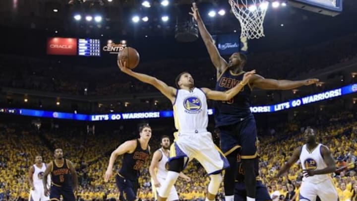 Jun 7, 2015; Oakland, CA, USA; Golden State Warriors guard Stephen Curry (30) shoots the ball against Cleveland Cavaliers center Tristan Thompson (13) during the first quarter in game two of the NBA Finals at Oracle Arena. Mandatory Credit: Kyle Terada-USA TODAY Sports Jun 7, 2015; Oakland, CA, USA; Golden State Warriors guard Stephen Curry (30) shoots the ball against Cleveland Cavaliers center Tristan Thompson (13) during the first quarter in game two of the NBA Finals at Oracle Arena. Mandatory Credit: Kyle Terada-USA TODAY Sports