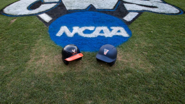 June 23, 2014: The batting helmets for the two teams Virginia and Vanderbilt during the first game of the finals of the College World Series at TD Ameritrade Park in Omaha, Nebraska. (Photo by John S. Peterson/Icon SMI/Corbis via Getty Images)