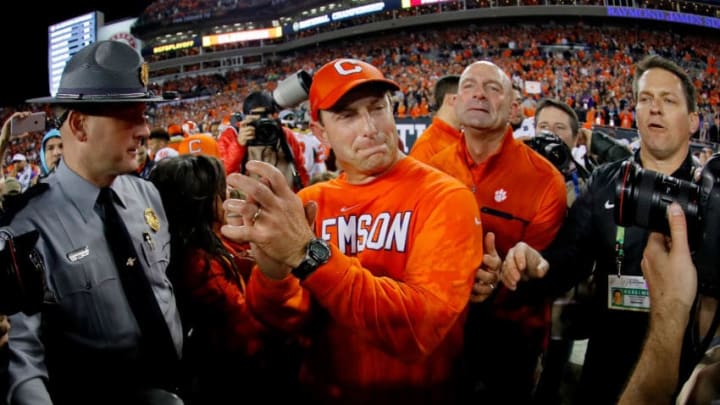 TAMPA, FL - JANUARY 09: Head coach Dabo Swinney of the Clemson Tigers reacts after defeating the Alabama Crimson Tide 35-31 to win the 2017 College Football Playoff National Championship Game at Raymond James Stadium on January 9, 2017 in Tampa, Florida. (Photo by Kevin C. Cox/Getty Images)