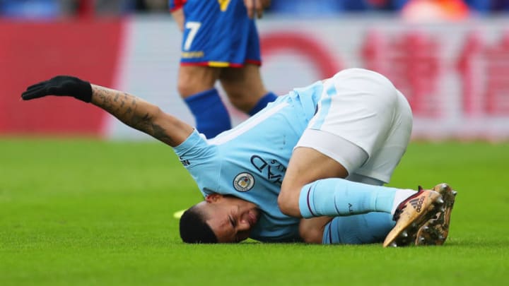 LONDON, ENGLAND - DECEMBER 31: Gabriel Jesus of Manchester City reacts as he is injured during the Premier League match between Crystal Palace and Manchester City at Selhurst Park on December 31, 2017 in London, England. (Photo by Catherine Ivill/Getty Images)