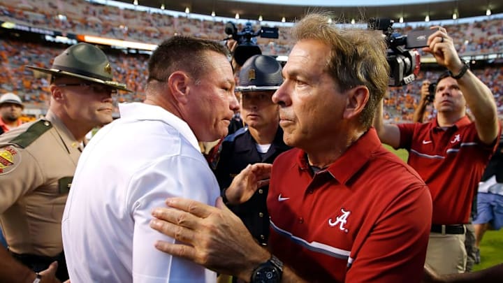 KNOXVILLE, TN - OCTOBER 15: Head coach Nick Saban of the Alabama Crimson Tide shakes hands with head coach Butch Jones of the Tennessee Volunteers after their 49-10 win at Neyland Stadium on October 15, 2016 in Knoxville, Tennessee. (Photo by Kevin C. Cox/Getty Images)