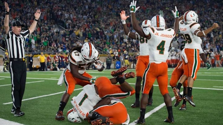 Oct 29, 2016; South Bend, IN, USA; The Miami Hurricanes celebrate after cornerback Michael Jackson (28) recovered a fumble in the end zone for a touchdown in the fourth quarter against the Notre Dame Fighting Irish at Notre Dame Stadium. Notre Dame won 30-27. Mandatory Credit: Matt Cashore-USA TODAY Sports Oct 29, 2016; South Bend, IN, USA; The Miami Hurricanes celebrate after cornerback Michael Jackson (28) recovered a fumble in the end zone for a touchdown in the fourth quarter against the Notre Dame Fighting Irish at Notre Dame Stadium. Notre Dame won 30-27. Mandatory Credit: Matt Cashore-USA TODAY Sports