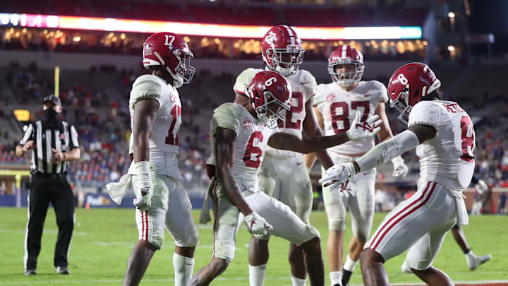 Oct 10, 2020; Oxford, MX, USA; Alabama receivers Jaylen Waddle (17), DeVonta Smith (6) and John Metchie III (8) celebrate during the game against Mississippi at Vaught-Hemingway Stadium. Mandatory Credit: Kent Gidley via USA TODAY Sports