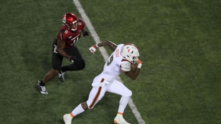 Brevin Jordan #9 of the Miami Hurricanes runs the ball against the Louisville Cardinals at Cardinal Stadium on September 19, 2020 in Louisville, Kentucky. (Photo by Andy Lyons/Getty Images)