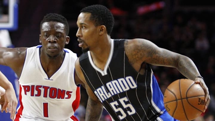 Mar 23, 2016; Auburn Hills, MI, USA; Orlando Magic guard Brandon Jennings (55) dribbles the ball as Detroit Pistons guard Reggie Jackson (1) defends during the first quarter at The Palace of Auburn Hills. Mandatory Credit: Raj Mehta-USA TODAY Sports